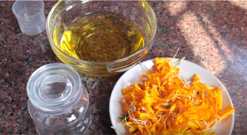 Marigold oil for removing black spot. 