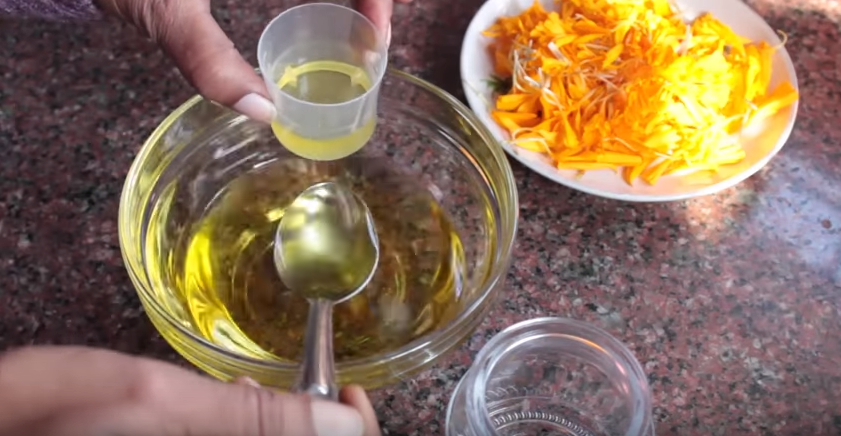 Marigold oil for removing black spot. 